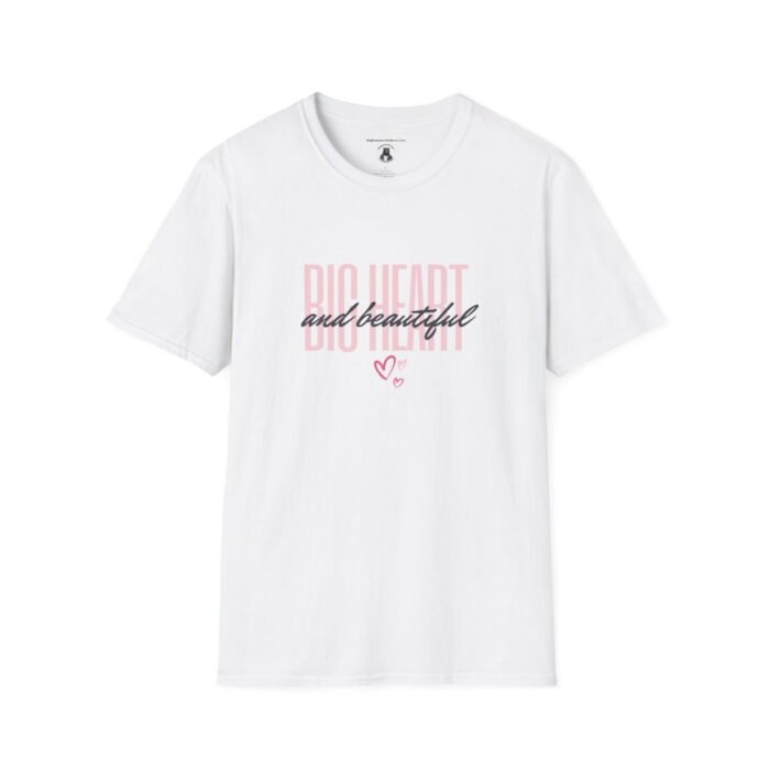 A white colored t-shirt blank with words "Big Heart and beautiful" written on it, and some hearts, with various shades of pink.