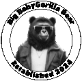 The Big Baby gorilla Bear Mascot, which is a grizzly bear with the nose, face, and mouth of a gorilla, wearing cool shades, looking swag, with a white t-shirt, sleeveless leather jacket, and a gold chain.The mascot is inside of a corcle, with the company name and the words "Established 2024" surrounding the mascot.
