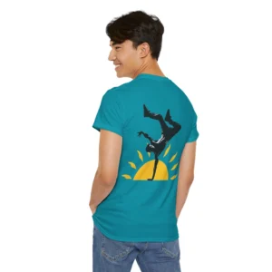 Kiss The Sun Breakdancing, Tropical Blue colored, showing the backside of the shirt with a breakdancer silhouette doing a handstand with a sunshine behind him.