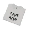 Folded Ice Grey Colored "I Got 99 Problems, But Being Rich Ain't One of Them!" T-shirt.