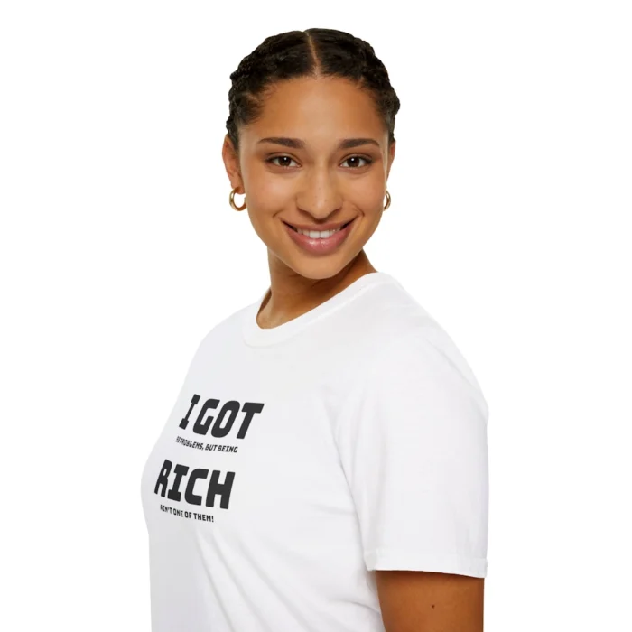 Female model wearing a white "I Got 99 Problems, But Being Rich Ain't One of Them!" T-shirt.