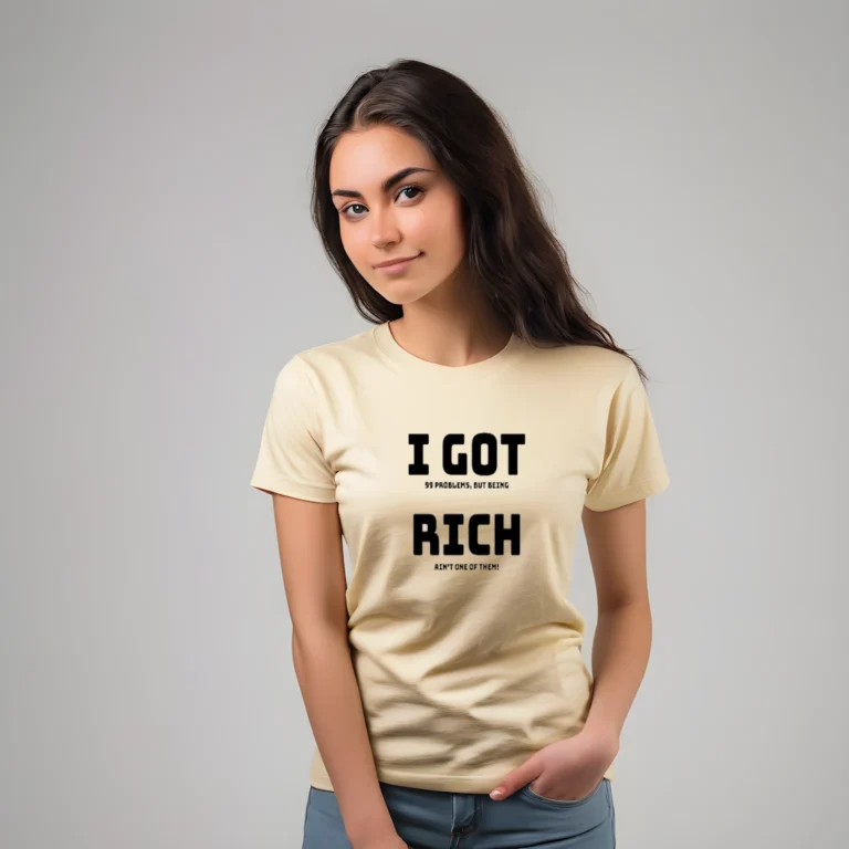 Beautiful female model wearing a sand colored BBGB T-shirt with the saying "I Got 99 problems, but being rich ain't one of them!". The shirt looks like it says "I Got Rich" from a distance.