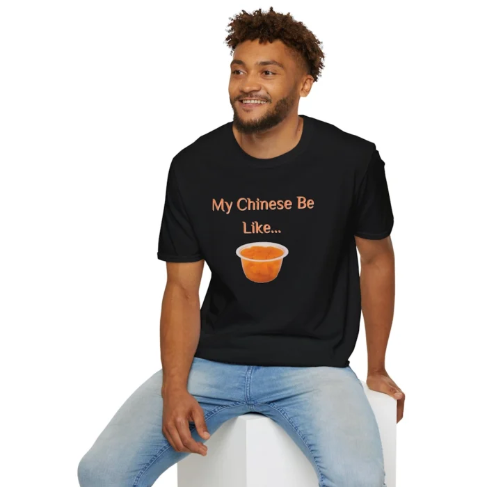 Attractive Male Model, Wearing a black t-shirt with the writing "My Chinese Be Like..." and a picture of Mandarin Oranges.
