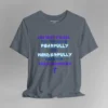 A steel blue colored tee with the words "Do Not Fear, For You Were Fearfully and Wonderfully Made For This Moment" in varying fonts and colors (purple, deep blue, and light aqua blue). There is a graphic, artistic purple cross beneath the words.