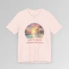 Soft pink colored t-shirt mock-up showing a pastel colored beach scene, with lines that look like blinds, cutting out evenly spaced sections of the image. 3-d, curved words beneath the image " My Vacay Goes Hard".