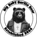 The Big Baby gorilla Bear Mascot, which is a grizzly bear with the nose, face, and mouth of a gorilla, wearing cool shades, looking swag, with a white t-shirt, sleeveless leather jacket, and a gold chain.The mascot is inside of a corcle, with the company name and the words "Established 2024" surrounding the mascot.