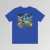 A true royal colored graphic tee with an image of an astronaut leaping high above crowds in a football stadium at night, about to catch a football, on the back of the tee. The background is warped, as if the astronaut is moving at super-human speeds.