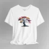 A white t-shirt with a graphic image of a blued liquid metal tree, with leaves of orange, pink, coral, and magenta on the front of the t-shirt.