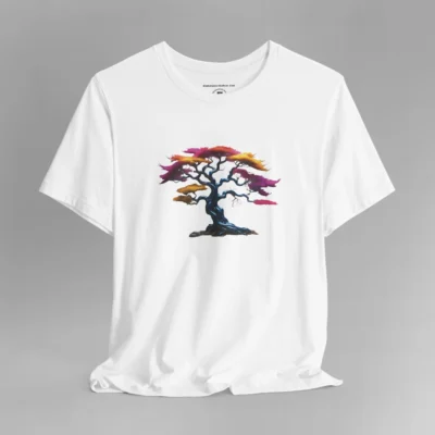 A white t-shirt with a graphic image of a blued liquid metal tree, with leaves of orange, pink, coral, and magenta on the front of the t-shirt.