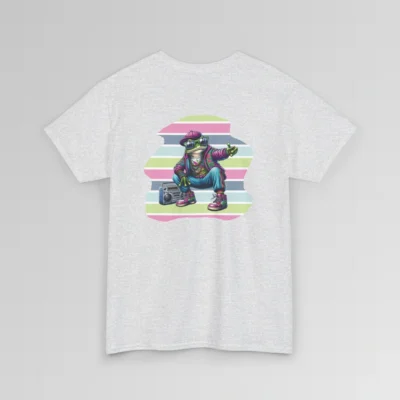 An ash colored t-shirt mockup with a 1980's styled anthropomorphic frog, wearing pants, shoes, hat, and jacket with shades. The frog is kneeling by a beatbox, and there is a non-symmetrical backdrop with varied colored lines in a ship-lap pattern. Shirt graphic colors are pinks, greens, blues, purples, steel blues, light blues, and white and cream colors.