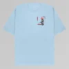 Frontside: A light blue tee with a black outlined samurai holding out a sword, with a red sunset and a branch from a cherry tree behind him. In read writing there are the Japanese scripts for samurai and sakura.