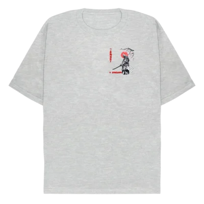 Frontside: A sport grey tee with a black outlined samurai holding out a sword, with a red sunset and a branch from a cherry tree behind him. In read writing there are the Japanese scripts for samurai and sakura.