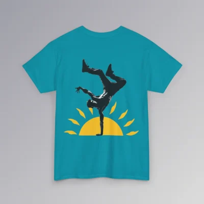 The BigBabyGorillaBear.Com "Kiss The Sun Breakdancing", tropical blue colored, t-shirt, with a male model showing the backside of the shirt with a break-dancer silhouette doing a handstand with a sunshine graphic behind him.