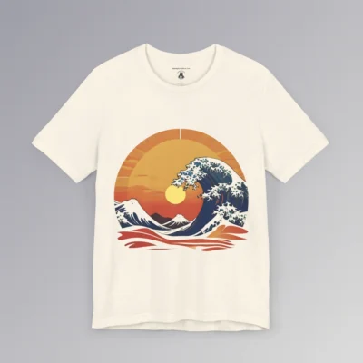 The frontside of a natural colored t-shirt with an oriental feel, and a blue wave white-capping, with a sunset in the background. The wave looks as if it touches the sun. There are mountains, clouds, and gentle waves, with hues of orange, red, and yellows.