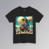 The "SWAG Frog" men's classic t-shirt, with a frog in a business suit, holding a basketball, on a beach basketball court, with the sun in the background and creative font that says "SWAG" at the bottom of the graphic. Graphic on the frontside; color black.