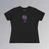 A black colored t-shirt with a vibrant, multi-colored flower on the front of the t-shirt. The graphic looks as if it has been created with splashing vibrant colored paints, with hues of blue, violet, pink, and orange.