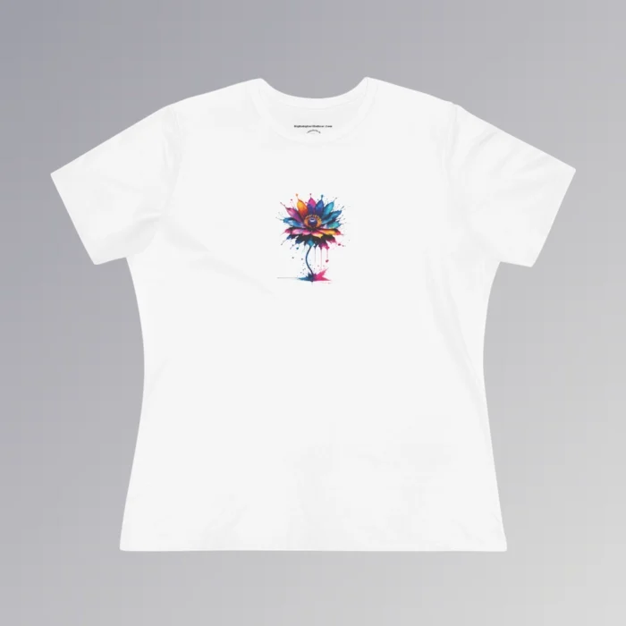 A white colored t-shirt with a vibrant, multi-colored flower on the front of the t-shirt. The graphic looks as if it has been created with splashing vibrant colored paints, with hues of blue, violet, pink, and orange.