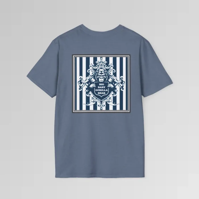 The back of a heather indigo colored t-shirt mockup with navy and white vertical stripes in a grey, triple lined frame, with an elaborate crest of a gorilla bear creature, holding a shield that has the words "Big Baby Gorilla Bear" on it.