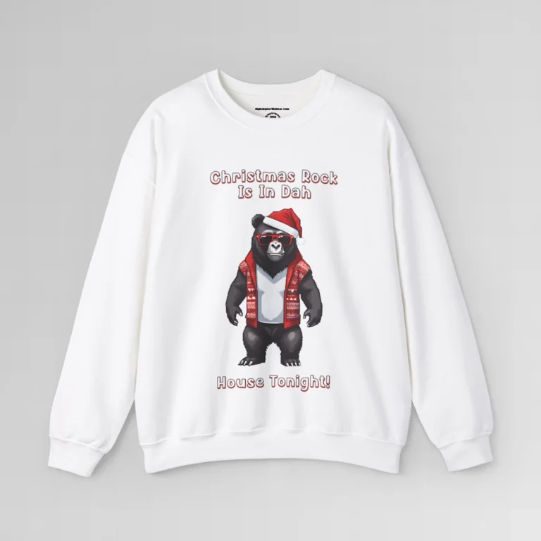 A white sweatshirt with a slightly pixelated Big Baby Gorilla Bear Mascot image in a Christmas sweater, with a Santa hat on, with words in 3-D font that say "Christmas Rock Is In Dah House Tonight!