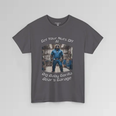 The front of a T-shirt mockup that reads "Get Your Nuts Off At Big Baby Gorilla Bear's Garage", with an image of the Big Baby Gorilla Bear Mascot in a blue mechanic jump suit, standing in a garage. Charcoal colored shirt.
