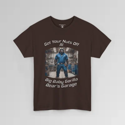 The front of a T-shirt mockup that reads "Get Your Nuts Off At Big Baby Gorilla Bear's Garage", with an image of the Big Baby Gorilla Bear Mascot in a blue mechanic jump suit, standing in a garage. dark brown colored shirt.