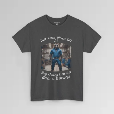 The front of a T-shirt mockup that reads "Get Your Nuts Off At Big Baby Gorilla Bear's Garage", with an image of the Big Baby Gorilla Bear Mascot in a blue mechanic jump suit, standing in a garage. Dark heather colored shirt.