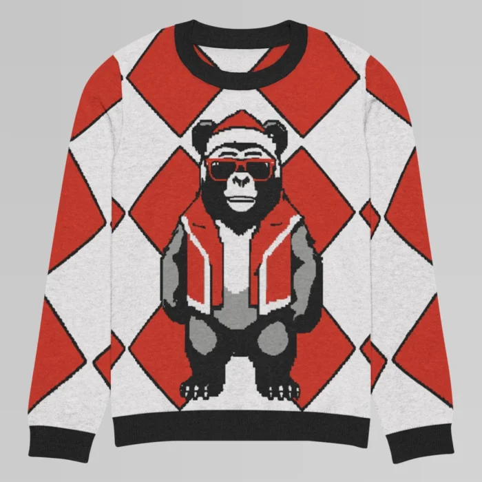 The front side of a sweater mockup of a red checkered knit sweatshirt with a slightly pixelated gorilla-bear hybrid (our mascot) on the front and back. The gorilla bear is wearing a Christmas Hat, Red shades, and a Santa hat.