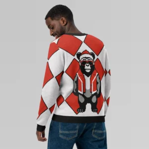 A male model showcasing the back side of a sweater with a red checkered knit sweatshirt with a slightly pixelated gorilla-bear hybrid (our mascot) on the front and back. The gorilla bear is wearing a Christmas Hat, Red shades, and a Santa hat.