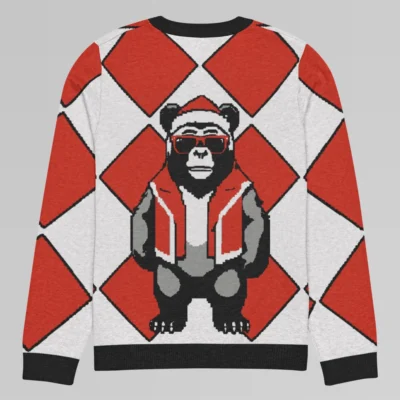 The back side of a sweater mockup of a red checkered knit sweatshirt with a slightly pixelated gorilla-bear hybrid (our mascot) on the front and back. The gorilla bear is wearing a Christmas Hat, Red shades, and a Santa hat.