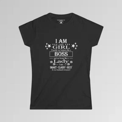 Black tee, with stars and roses, that says "I am a girl's girl, I handle my business like a boss, and my house like a lady, I am smart, classy, sexy, and my husband's treasure!"
