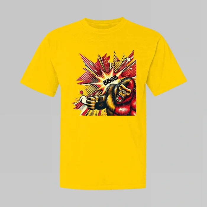 The front of a streetwear tee with a red and yellow and brown gorilla-bear hybrid creature, looking angry, throwing a punch, with a red and yellow comic strip type background, and the letters "BBGB". Yellow Shirt - Front side.