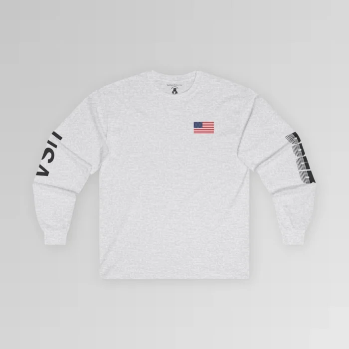 The frontside of the Ash colored BBGB USA Full Stack Long Sleeve Tee, with an American Flag on the front left breast section, and the letters "USA" on the right sleeve, and "BBGB" on the left sleeve. The Letters "BBGB" have transparent lines going through the lower portion of the letters.