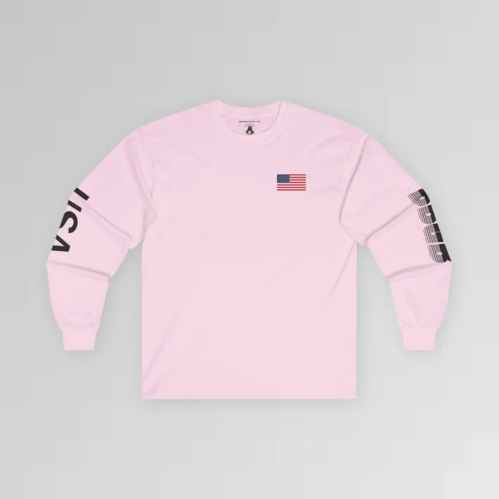 The frontside of the pink colored BBGB USA Full Stack Long Sleeve Tee, with an American Flag on the front left breast section, and the letters "USA" on the right sleeve, and "BBGB" on the left sleeve. The Letters "BBGB" have transparent lines going through the lower portion of the letters.