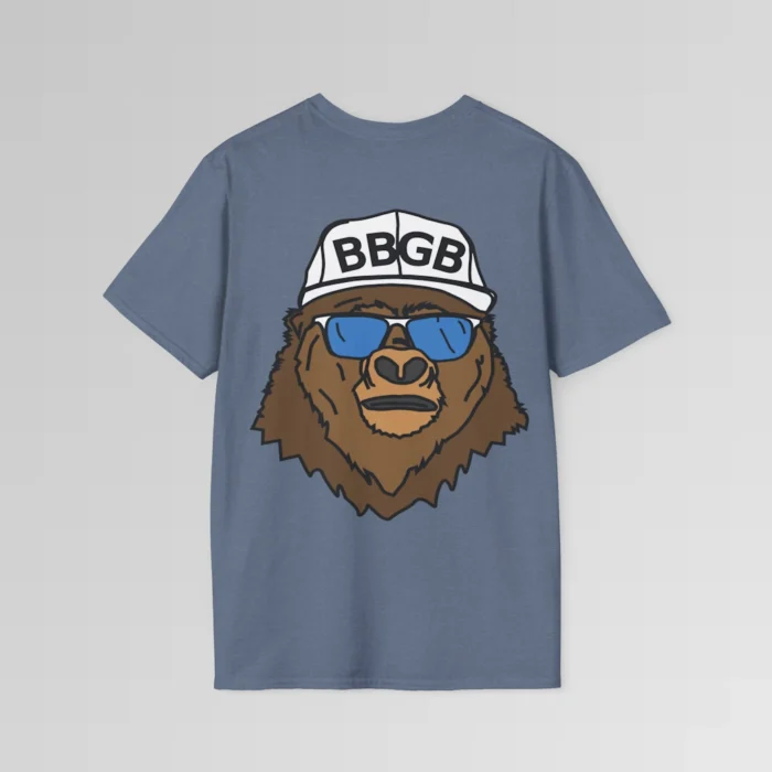 The back of a heather indigo colored shirt, with the Big Baby Gorilla Bear Mascot's face, wearing a white ball cap, and blue and white shades, super imposed on the back of a tee shirt.