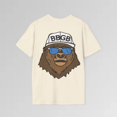 The back of a natural colored shirt, with the Big Baby Gorilla Bear Mascot's face, wearing a white ball cap, and blue and white shades, super imposed on the back of a tee shirt.