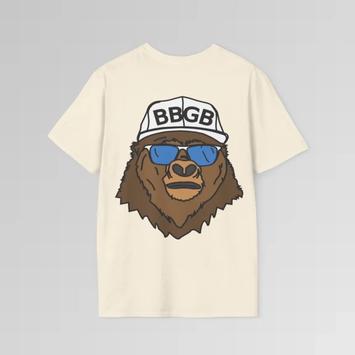 The back of a natural colored shirt, with the Big Baby Gorilla Bear Mascot's face, wearing a white ball cap, and blue and white shades, super imposed on the back of a tee shirt.