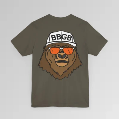 The back of a army colored shirt, with the Big Baby Gorilla Bear Mascot's face, wearing a white ball cap, and orange and white shades, super imposed on the back of a tee shirt.