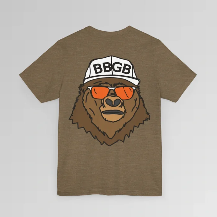 The back of a heather olive colored shirt, with the Big Baby Gorilla Bear Mascot's face, wearing a white ball cap, and orange and white shades, super imposed on the back of a tee shirt.