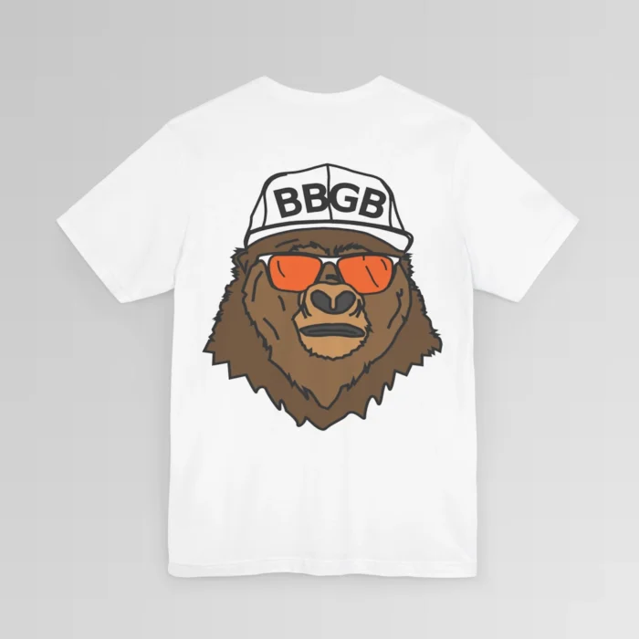 The back of a white colored shirt, with the Big Baby Gorilla Bear Mascot's face, wearing a white ball cap, and orange and white shades, super imposed on the back of a tee shirt.