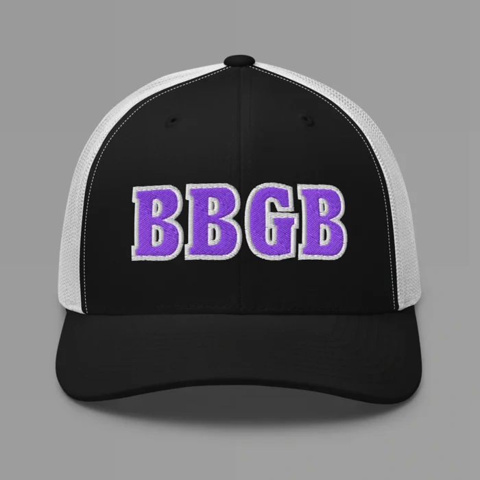 A black and white hat with the letters "BBGB" embroidered on the front in purple thread, with a white border, on a trucker cap with a mesh back.