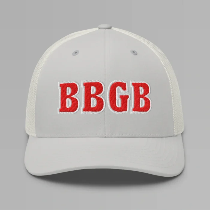 A silver hat with the letters "BBGB" embroidered on the front in red thread, with a white border, on a trucker cap with a mesh back.