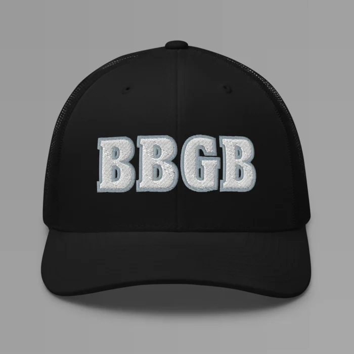 A black hat with the letters "BBGB" embroidered on the front in white thread, with a silver border, on a trucker cap with a mesh back.