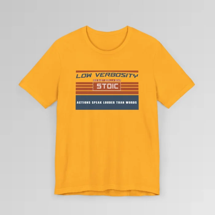 An orange and blue rectangular graphic, block styled", with the words "Low Verbosity", "Big Baby Gorilla Bear", "Stoic", and "Actions Speak Louder Than Words" on the front of the t-shirt. Color; Gold.