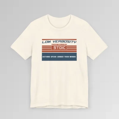 An orange and blue rectangular graphic, block styled", with the words "Low Verbosity", "Big Baby Gorilla Bear", "Stoic", and "Actions Speak Louder Than Words" on the front of the t-shirt. Color; Natural.